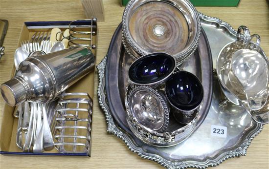 An Old Sheffield plate wine funnel, a pair of plated salts, a Victorian plated wine coaster and other plated wares